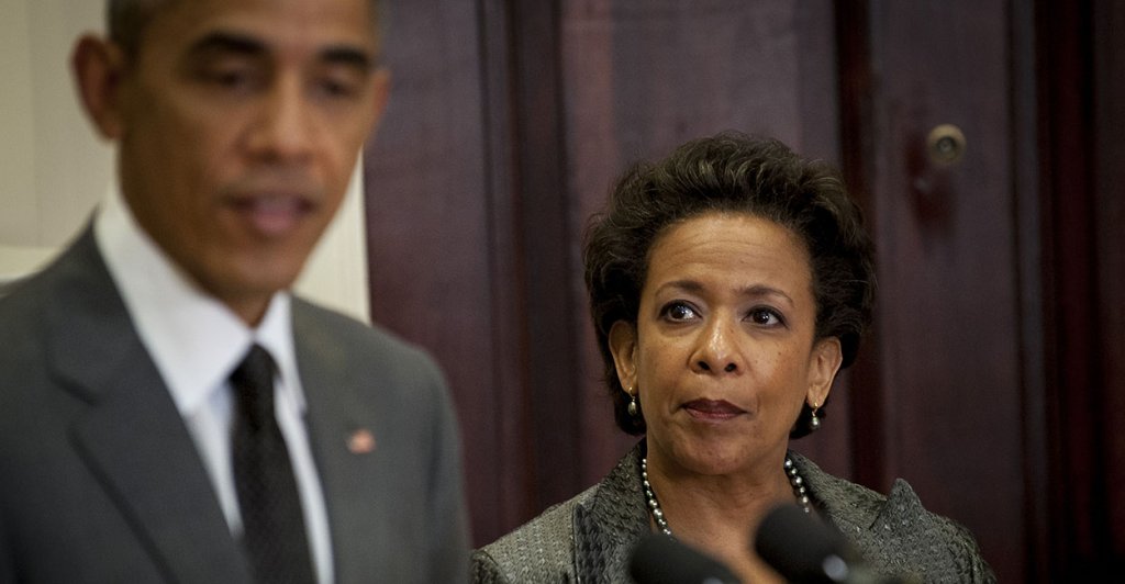 With United States Attorney General Eric Holder looking on from left, U.S. President Barack Obama, center, announces his nomination of Loretta Lynch, U.S. Attorney in Brooklyn, New York, right, to become the next attorney general during an announcement in the Roosevelt Room of the West Wing of the White House in Washington, District of Columbia, U.S., on Saturday, Nov. 8, 2014. Eric Holder announced his plans in September to step down. Photo Credit: Pete Marovich/CNP/AdMedia (Newscom TagID: admphotostwo092749.jpg) [Photo via Newscom]