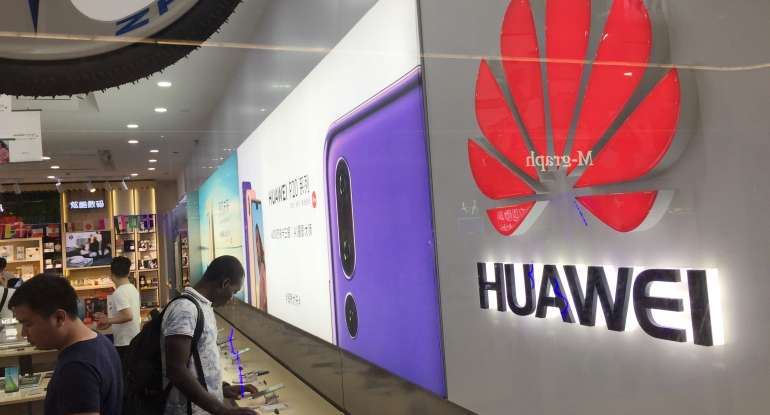 Customers shop at a Huawei store in china